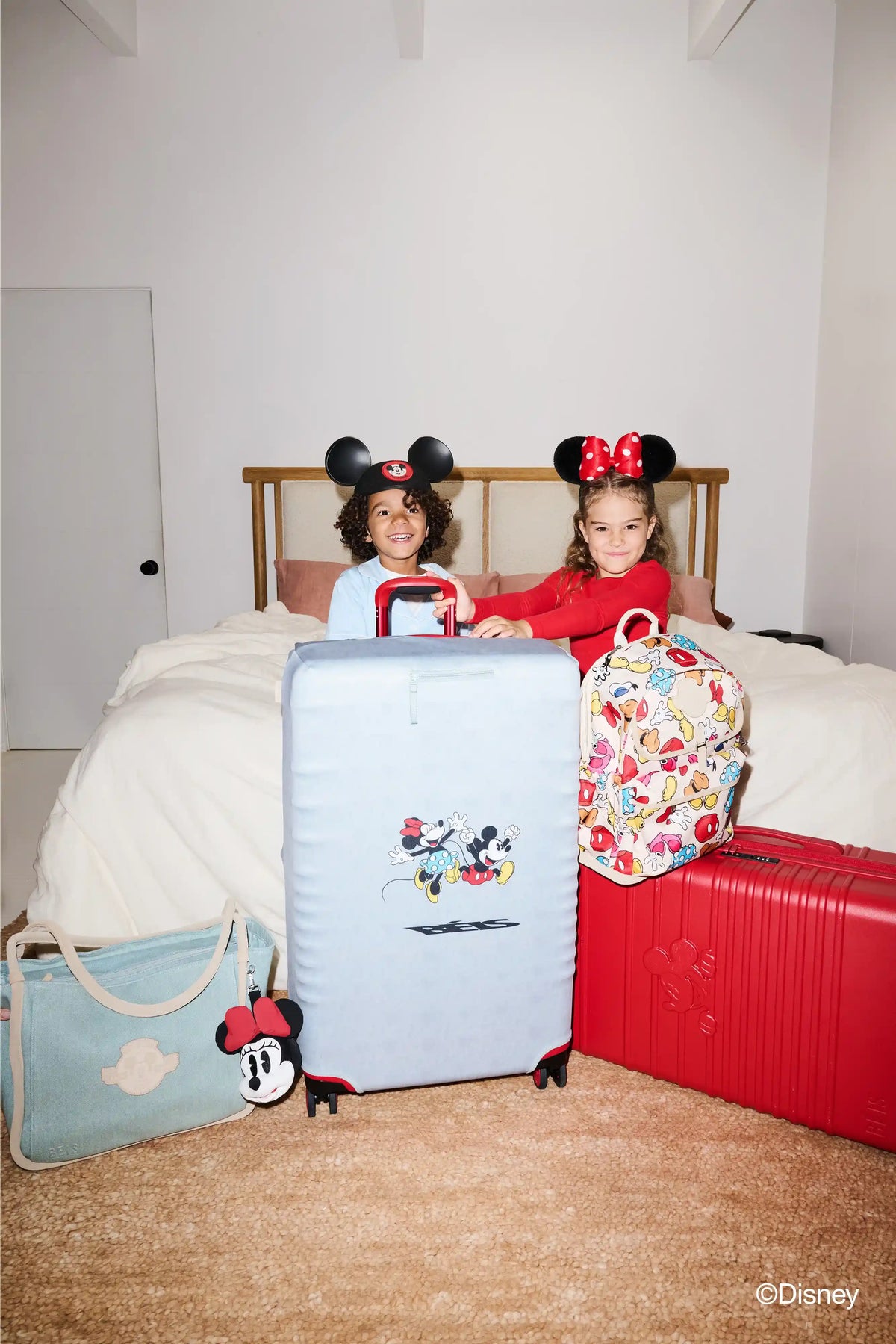 The Disney Large Check-In Luggage Cover in Blue Jeans