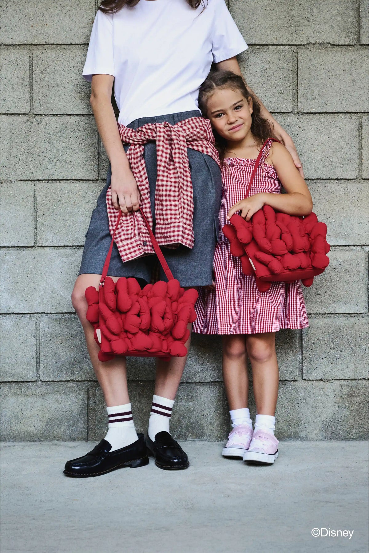 The Minnie Bow Handbag in Mickey Mouse Red